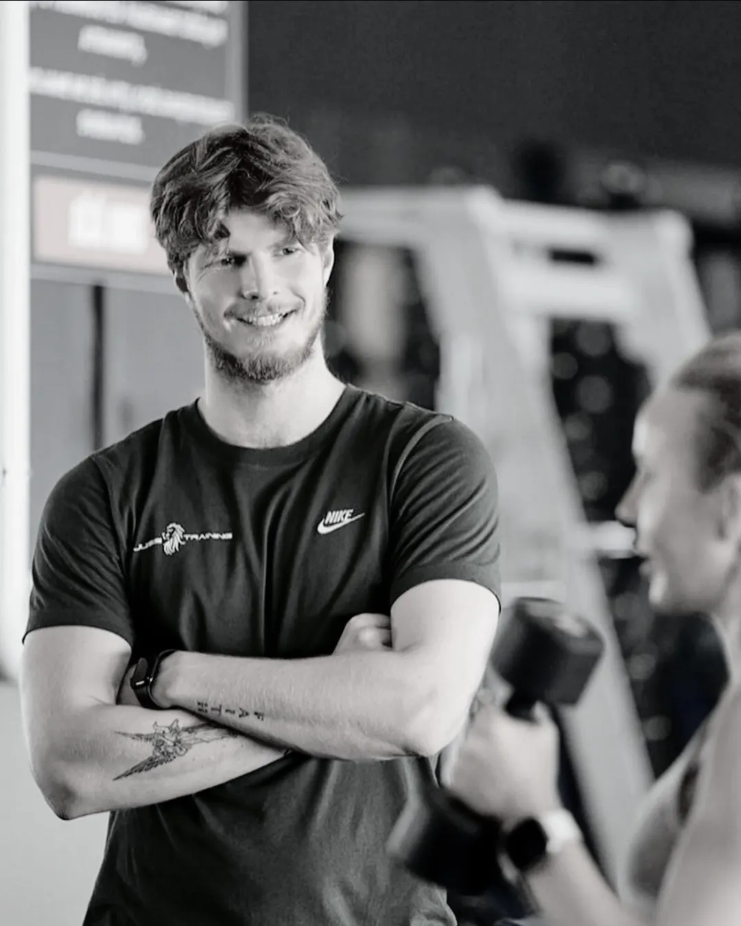 Ernestas Barkus working with an athlete