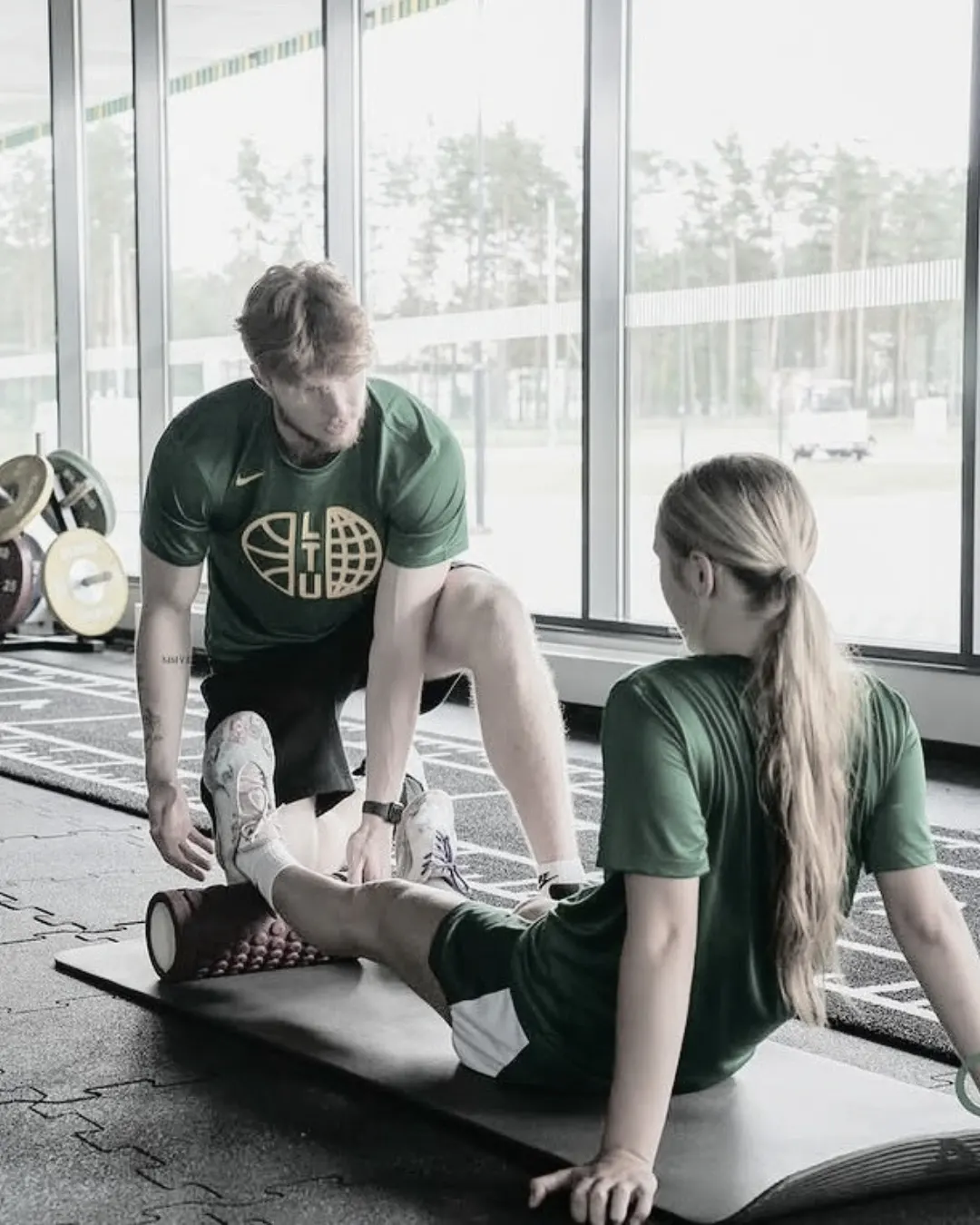 Ernestas Barkus coaching a national team athlete